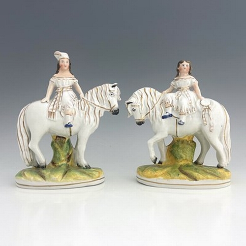 1048 - A Staffordshire figure pair of royal children on horseback, circa 1850, attributed to Thomas Parr, m... 