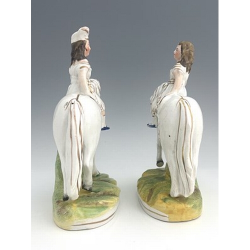 1048 - A Staffordshire figure pair of royal children on horseback, circa 1850, attributed to Thomas Parr, m... 