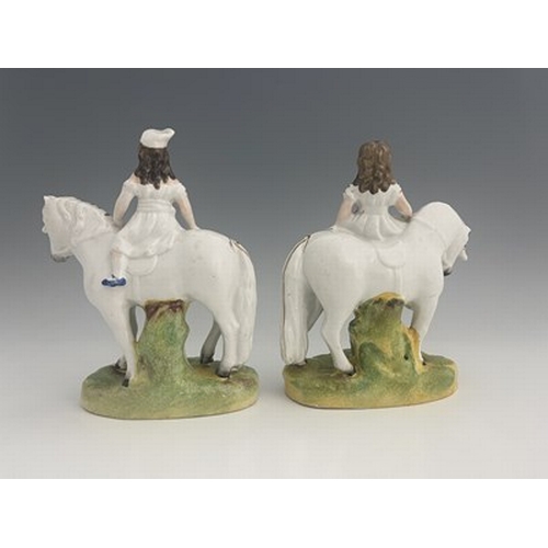 1048 - A Staffordshire figure pair of royal children on horseback, circa 1850, attributed to Thomas Parr, m... 