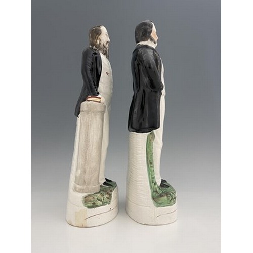 1052 - A pair of large Staffordshire portrait figures of 'Moody' and 'Sankey', circa 1870, modelled standin... 