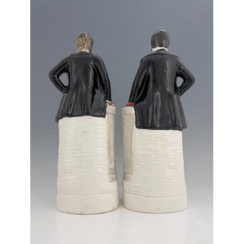 1052 - A pair of large Staffordshire portrait figures of 'Moody' and 'Sankey', circa 1870, modelled standin... 