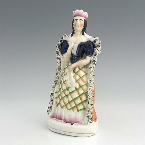 1057 - A Staffordshire figure of Sarah Siddons as Lady Macbeth, circa 1850, modelled as a Queen in textured... 