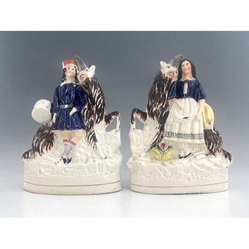 1062 - A pair of Staffordshire figures of royal children with goats, circa 1850, figures likely modelled as... 