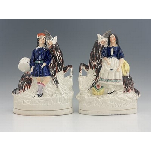 1062 - A pair of Staffordshire figures of royal children with goats, circa 1850, figures likely modelled as... 