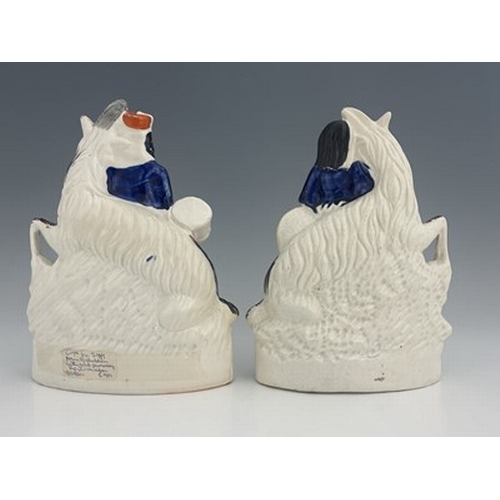 1062 - A pair of Staffordshire figures of royal children with goats, circa 1850, figures likely modelled as... 