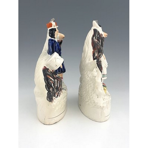 1062 - A pair of Staffordshire figures of royal children with goats, circa 1850, figures likely modelled as... 