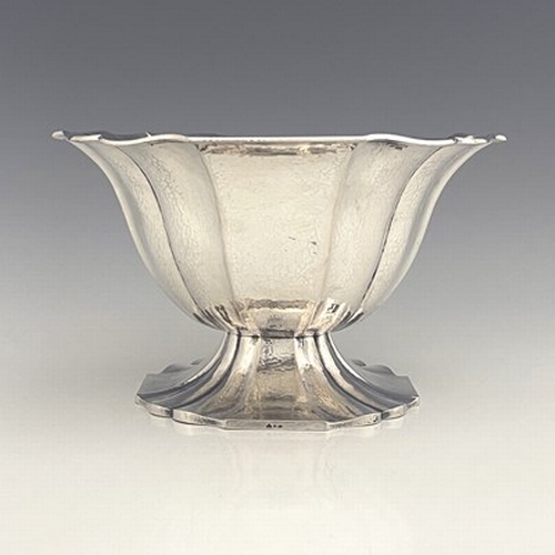 107 - Franz Bibus, a large Art Deco silver centrepiece bowl, circa 1935, planished with ogee fluting in th... 