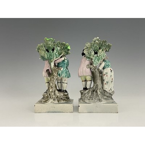 1078 - A pair of Staffordshire pearlware boccage figure groups, Ralph Wood, circa 1800, Tenderness and Frie... 