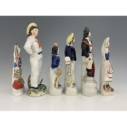 1080 - Six Staffordshire polychrome enamel painted figure groups, circa 1860, including one modelled as a s... 