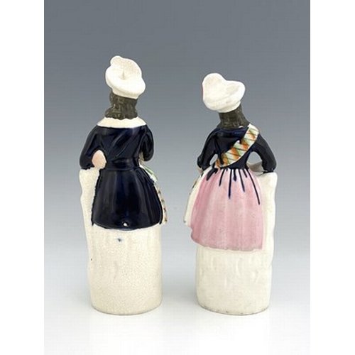 1084 - Staffordshire figure pair of Scottish musicians and dancers, circa 1850, modelled as a standing male... 