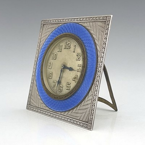 109 - An Art Deco silver and enamelled clock, Turner and Simpson, Birmingham 1928, square section, engine ... 