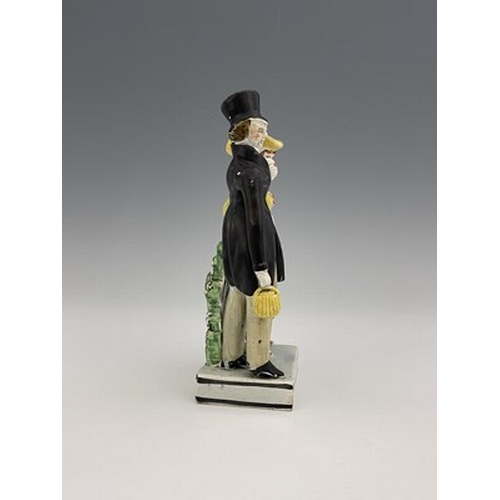 1092 - A Staffordshire pearlware figure group of the Dandies, early 19th century, on square platform base, ... 