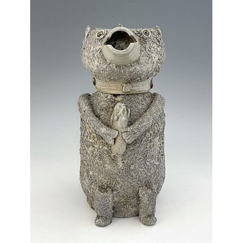 1093 - A Staffordshire off white salt glazed stoneware bear jar and cover, modelled as a sitting bear holdi... 