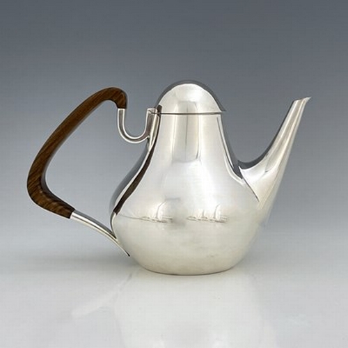 113 - Henning Koppel for George Jensen, a Danish Modernist silver coffee pot, model no.1017, designed 1952... 