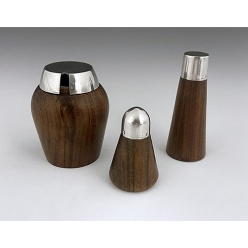 114 - A Spanish Modernist silver and walnut three piece cruet, circa 1960s, including mustard pot, salt sh... 