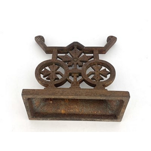 118 - Christopher Dresser for Coalbrookdale, an Aesthetic Movement cast iron andiron, circa 1870, the plin... 