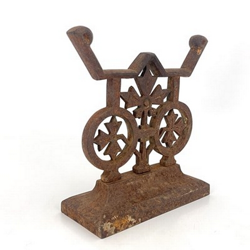 118 - Christopher Dresser for Coalbrookdale, an Aesthetic Movement cast iron andiron, circa 1870, the plin... 