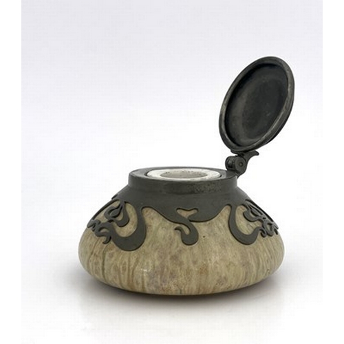 124 - Alexandre Bigot, an Art Nouveau pewter mounted art pottery inkwell, squat ovoid form, brown crystall... 