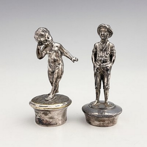 127 - WMF, two silver plated figural bottle stoppers, one modelled as a boy in lederhosen, the other as a ... 