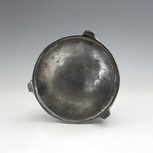 132 - Albin Muller for WMF, a pewter bottle coaster, circa 1905, circular form with three stylised bird he... 