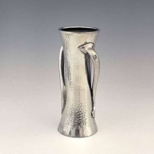 137 - Oliver Baker for Liberty and Co., an Arts and Crafts Tudric pewter vase, model 030, planished waiste... 