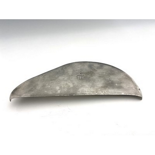 140 - Archibald Knox for Liberty & Co, a Tudric pewter crumb scoop, circa 1905, half-moon form with integr... 