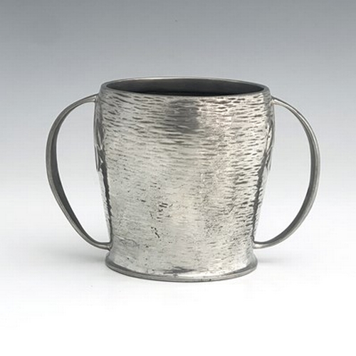 141 - Archibald Knox for Liberty and Co., an Arts and Crafts Tudric pewter twin handled mug, model 0929, o... 