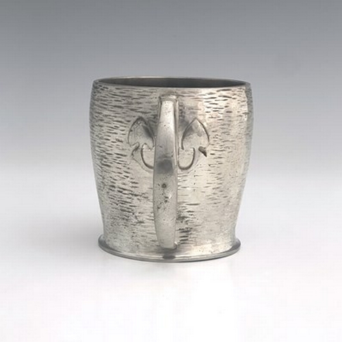 141 - Archibald Knox for Liberty and Co., an Arts and Crafts Tudric pewter twin handled mug, model 0929, o... 