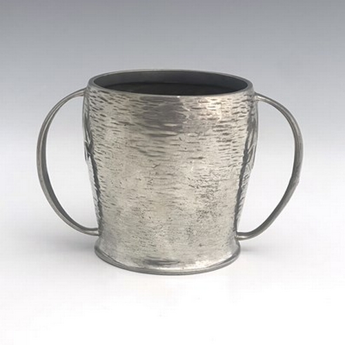 141 - Archibald Knox for Liberty and Co., an Arts and Crafts Tudric pewter twin handled mug, model 0929, o... 