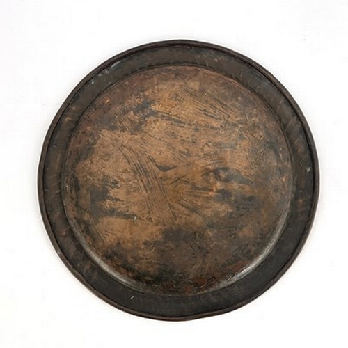 146 - Hugh Wallis, two large Arts and Crafts copper trays, one circular with ropetwist border, the other o... 