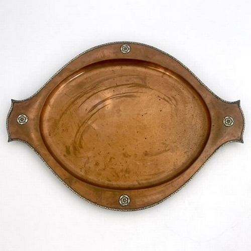 147 - A E Jones, an Arts and Crafts copper and silver tray, circa 1920, planished twin handled oval form w... 