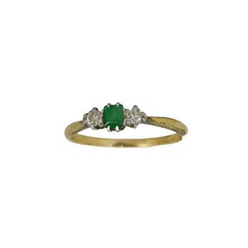 16 - An 18ct gold, diamond and emerald ring, the central green stone flanked by two rose cut diamonds, si... 