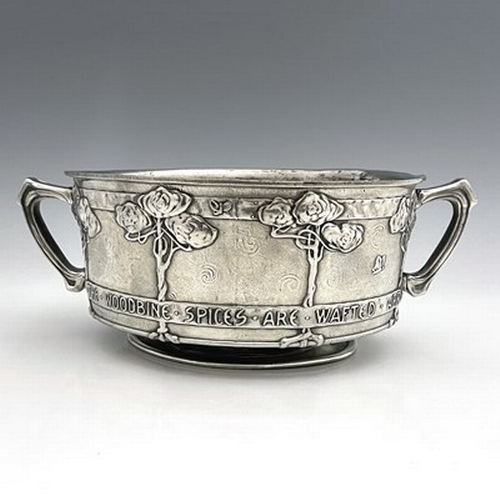 160 - David Veasey for Liberty and Co., an Arts and Crafts Tudric pewter twin handled bowl, model 011, foo... 