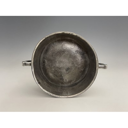 160 - David Veasey for Liberty and Co., an Arts and Crafts Tudric pewter twin handled bowl, model 011, foo... 