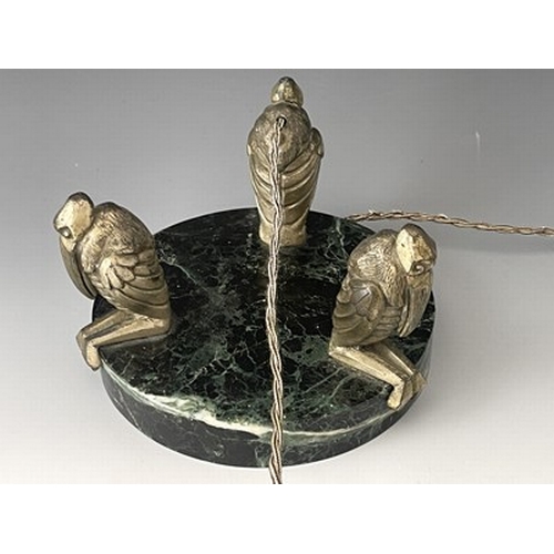 171 - An Art Deco patinated art metal and granite light fitting, circa 1930, modelled with three stylised ... 