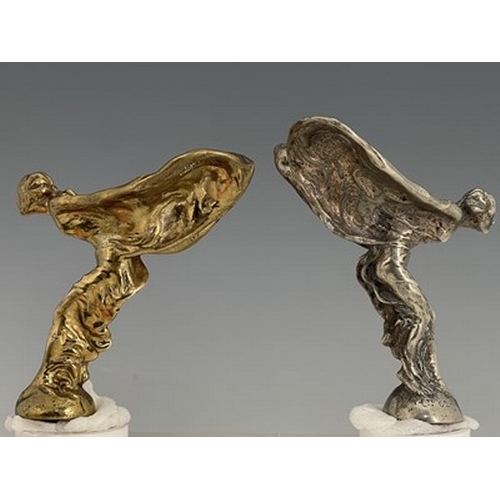 185 - Charles Sykes, Spirit of Ecstacy, two bronze Rolls Royce figural car mascots, one silvered, both cas... 