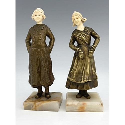 187 - Louis Sosson (attributed), a pair of Art Deco bronze and ivory figures, circa 1925, modelled as a Du... 