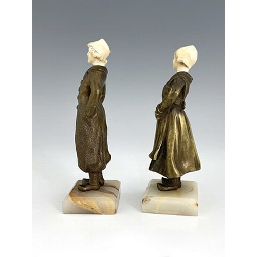 187 - Louis Sosson (attributed), a pair of Art Deco bronze and ivory figures, circa 1925, modelled as a Du... 