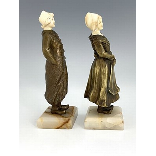 187 - Louis Sosson (attributed), a pair of Art Deco bronze and ivory figures, circa 1925, modelled as a Du... 