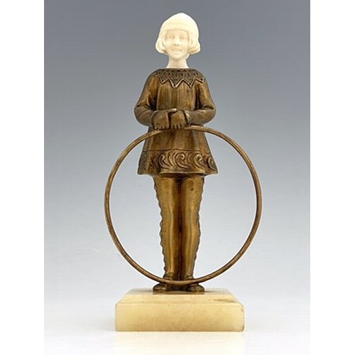 189 - Georges Omerth (Henri Tremko), an Art Deco bronze and ivory figure of a hoop girl, circa 1920, model... 