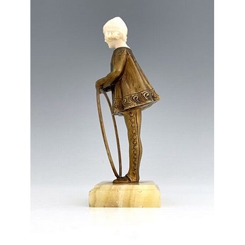 189 - Georges Omerth (Henri Tremko), an Art Deco bronze and ivory figure of a hoop girl, circa 1920, model... 