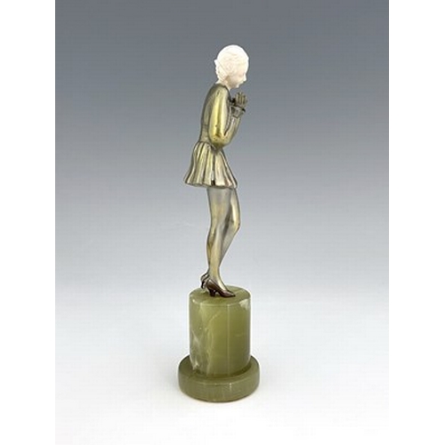 191 - Josef Lorenzl, an Art Deco silvered bronze and carved ivory figure, circa 1925, modelled as a woman ... 