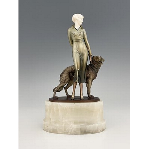 192 - Josef Lorenzl, an Art Deo cold painted bronze and carved ivory figure group, circa 1925, modelled as... 