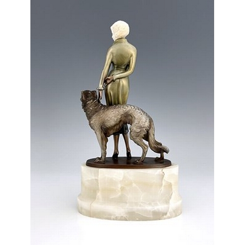 192 - Josef Lorenzl, an Art Deo cold painted bronze and carved ivory figure group, circa 1925, modelled as... 