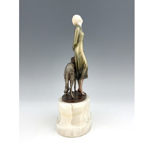 192 - Josef Lorenzl, an Art Deo cold painted bronze and carved ivory figure group, circa 1925, modelled as... 