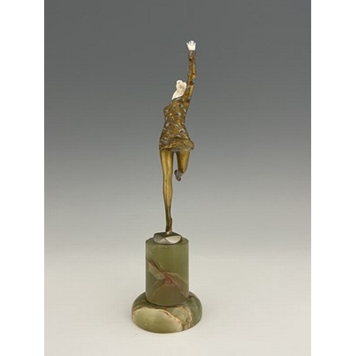 194 - Josef Lorenzl, an Art Deco enamelled gilt bronze and carved ivory figure, circa 1925, modelled as a ... 