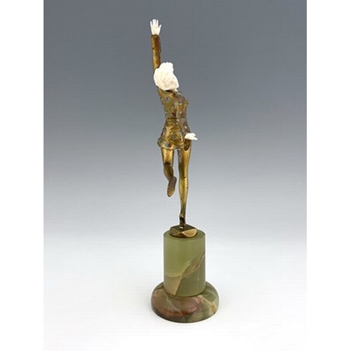 194 - Josef Lorenzl, an Art Deco enamelled gilt bronze and carved ivory figure, circa 1925, modelled as a ... 