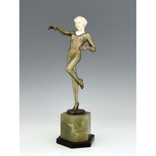 195 - Josef Lorenzl, an Art Deco patinated bronze and ivory figure, circa 1925, modelled as a dancer in le... 