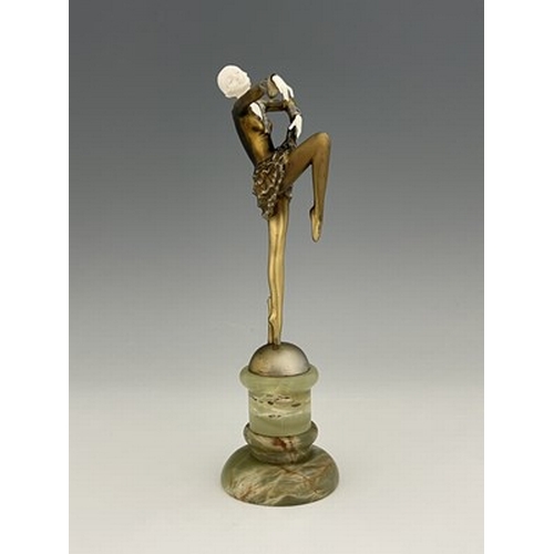 196 - Josef Lorenzl, an Art Deco gilt bronze and carved ivory figure, circa 1925, modelled as a dancer, in... 