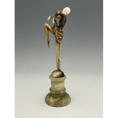 196 - Josef Lorenzl, an Art Deco gilt bronze and carved ivory figure, circa 1925, modelled as a dancer, in... 